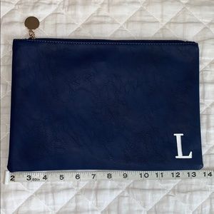 Navy zip clutch, “L” monogram